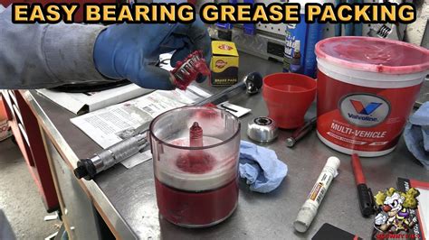 How To Use A Grease Packing Tool For Tapered Bearings Youtube