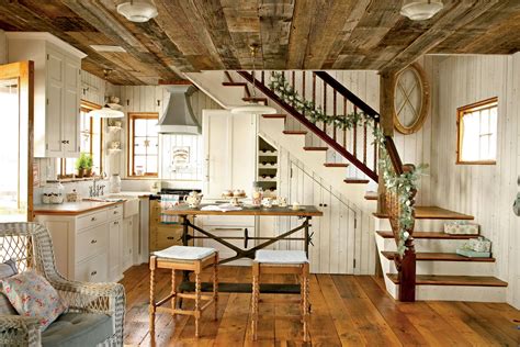 The Adorably Cozy Kitchen With Its Simple White Cabinetry And Walls