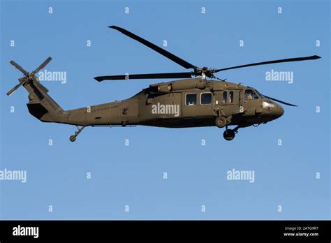 A Us Army Sikorsky Uh 60 Black Hawk Helicopter Coming In To Land At