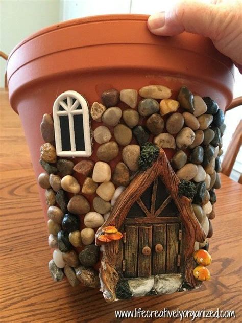 Here S How To Make A Sweetly Whimsical Diy Fairy House Planter From A