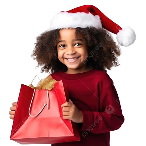 A Little Happy Black Girl In A Santa Hat And A Carrier Bag Prepares