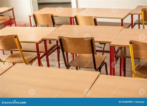 Chairs And Tables Inside Empty Classroom In Primary School Stock Image