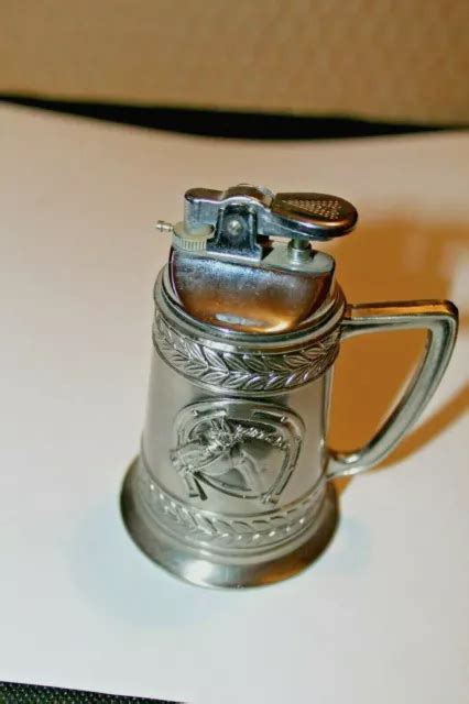 ANCIEN BRIQUET EN Forme De Chope A Bière Motifs Fer A Cheval Et Tete De