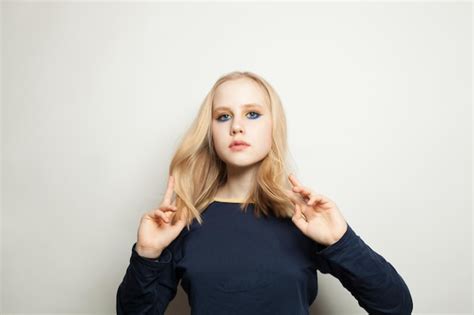 Premium Photo Blonde Girl Hand Motion On White