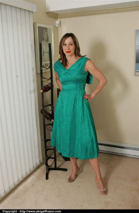 Hot Mature Babe With Ample Ass Taking Off Her Dress And Underskirt Porn Pictures XXX Photos