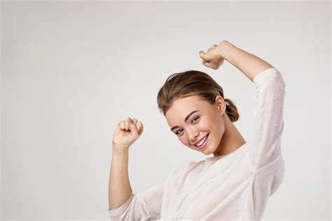 Premium Photo Portrait Of Smiling Beautiful Brunette Woman Dancing