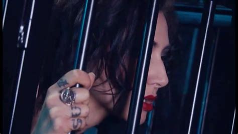 Brunette Slave Gets Fucked In A Cage By Two