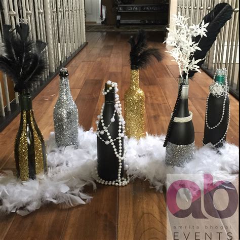 A Great Gatsby Theme Decor Sparkles Bottles Pearls Feathers