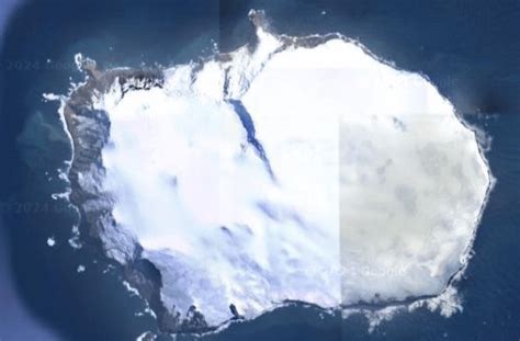 Can you tell me why does this island belong to norway in the middle of ...