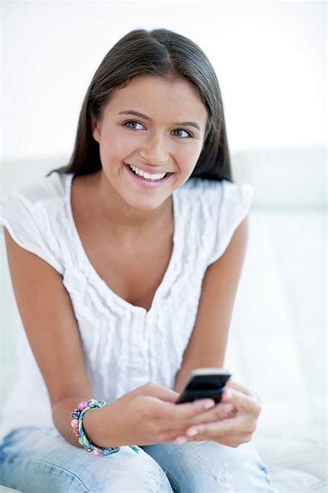 Teenage Girl Texting Photograph By Ian Hooton Science Photo Library