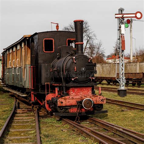 Vintage Locomotive Steam Train In An Outdoor Depot Stock Image