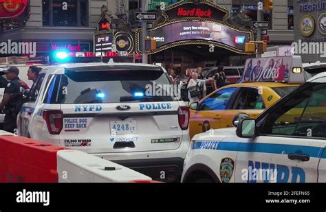 New York Usa Nypd Police Cars And Busy Traffic On Times Square Slow Stock Video Footage Alamy