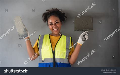 Portrait Attractive Africanamerican Woman Standing Plastering Stock