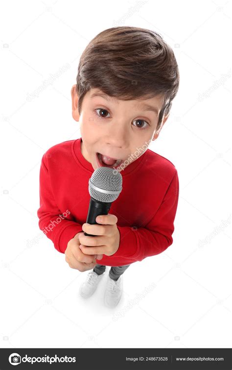 Cute Little Boy Singing Into Microphone On White Background — Stock