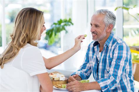 Woman Feeding Man Grapes Stock Photos Free And Royalty Free Stock