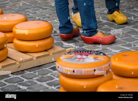 Clogs And Cheese Wheels In The Gouda Cheese Market Netherlands Stock