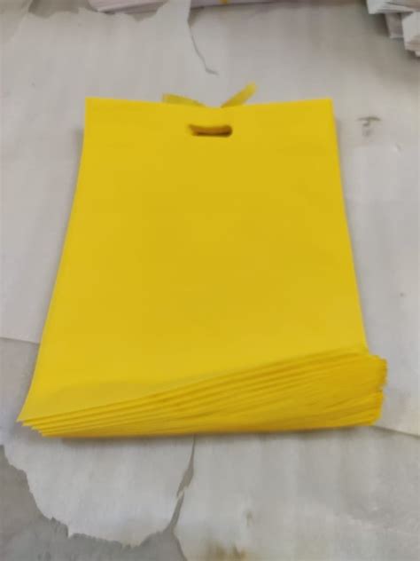 Plain Yellow Non Woven D Cut Bag For Shopping At Rs Kg In