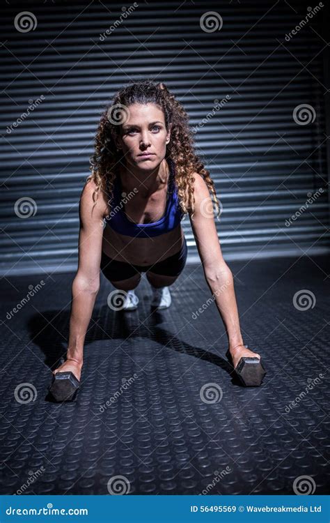 Muscular Woman Doing Push Ups With Dumbbells Stock Image Image Of