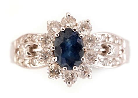 Lot 2 - Sapphire and diamond cluster ring