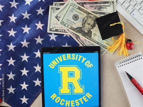 In this photo illustration, University of Rochester logo seen displayed ...