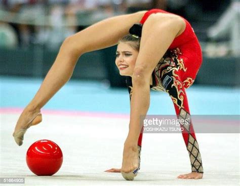 European Champion Alina Kabaeva Of Russia Strikes Pose With The Ball