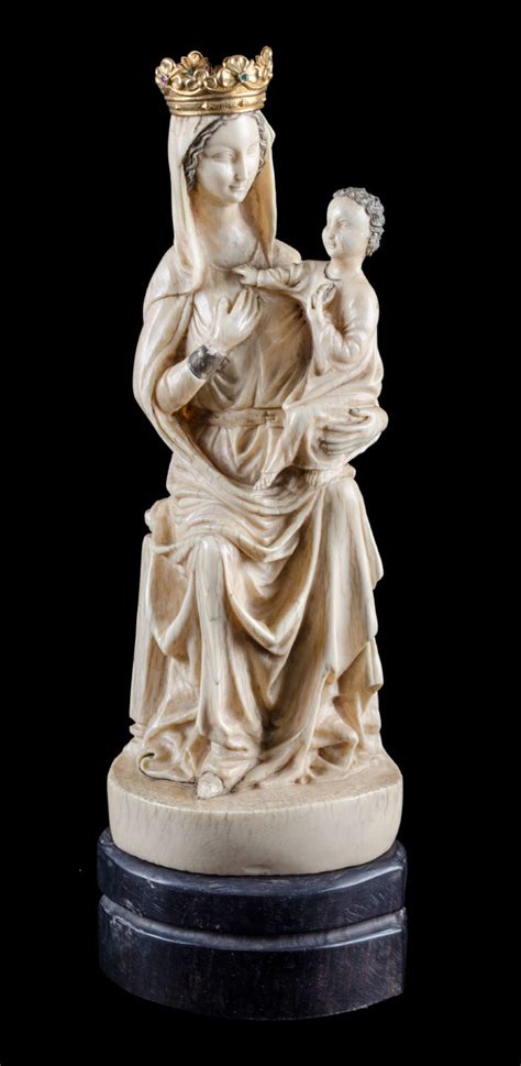 Scultura In Avorio Raffigurante Madonna Con Bambino Base In Legno