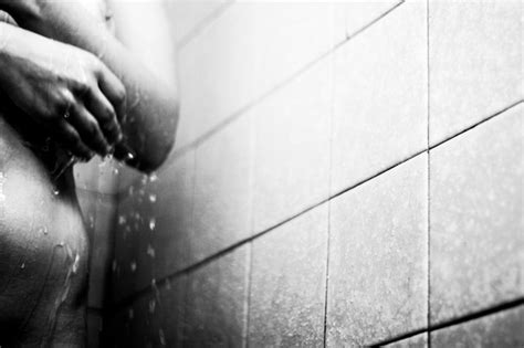 Premium Photo Midsection Of Naked Woman Taking Shower In Bathroom