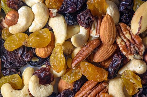 Background With A Cashew Hazelnuts Raisins And Peanuts Mixed Nuts