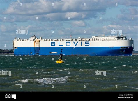 a glovis car carrier ship in the solent leaving the port of southampton docks in the solent ...