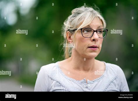 Mature Woman Looking Away Stock Photo Alamy