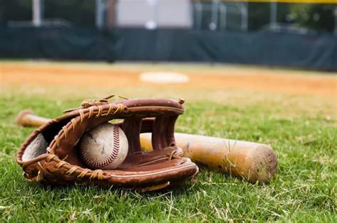 Old Baseball And Glove On Field Stock Photo By ©dehooks 5909181