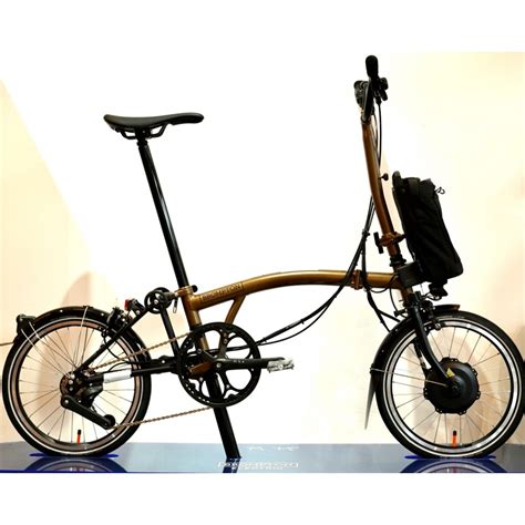 Brompton Electric P Line Urban High Bar Folding Bike Bronze Sky