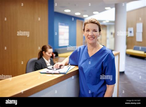 Nurse Standing In Hospital Waiting Room Stock Photo Alamy