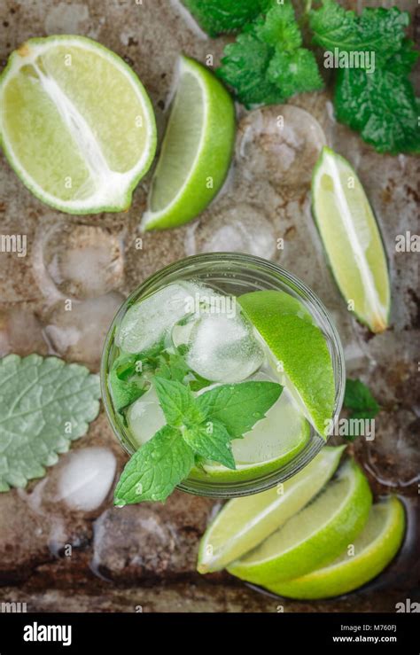 Mojito Cocktail Or Lemonade With Lime Mint And Ice Cubes Traditional