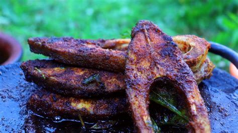 Big Fish Fry Prepared And Eat By Hungry Man In Forest Village Style