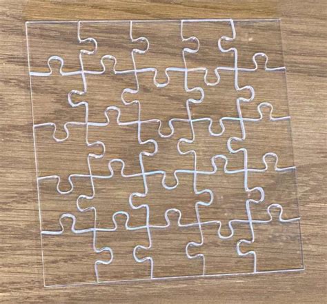 This Tiny Impossible Puzzle Uses Transparent Jigsaw Pieces To Make It