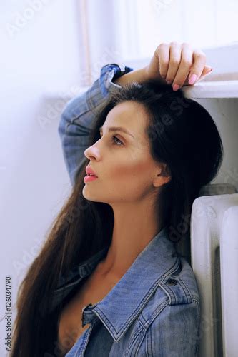 fashion studio photo of beautiful young woman with long dark hair in lingerie Stock 사진 Adobe Stock