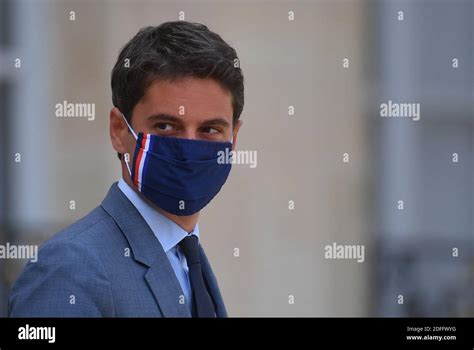 French government spokesman Gabriel Attal leaves the Elysee palace ...