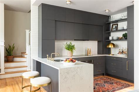 Gray Kitchen Peninsula With White Quartz Waterfall Edge Transitional