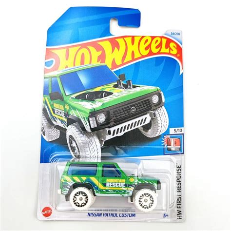 Машинка коллекционная Mattel Hot Wheels NISSAN PATROL CUSTOM купить с доставкой по