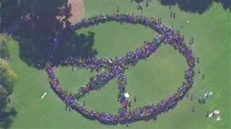 Thousands form human peace sign in Central Park to honor John Lennon - ABC7 New York