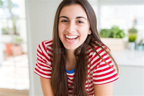 Beautiful Young Brunette Woman Smiling Cheerful Looking At The Camera