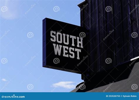Southwest Sign Brand and Text Logo on Wall Facade Store on Side Car ...