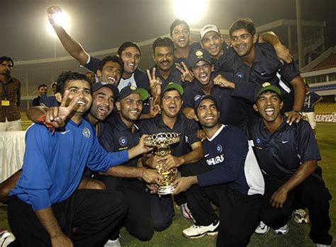 Chris Gayle Lofts The Kfc Cup Trophy After Jamaica Beat Trinidad