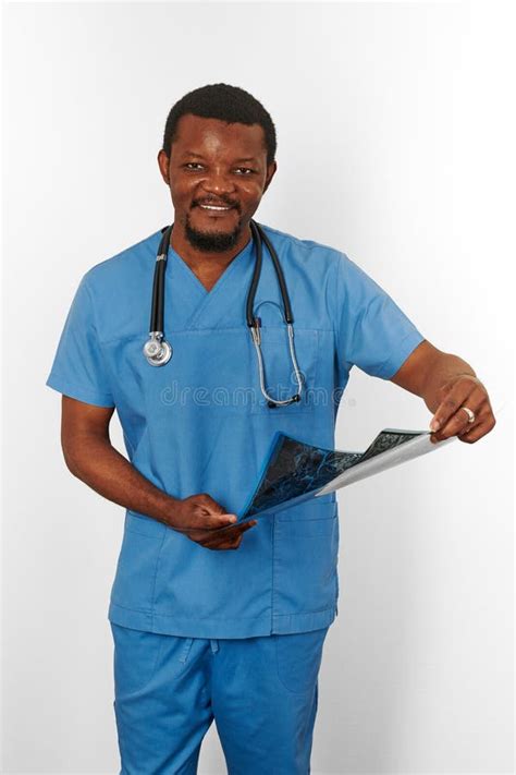 Black Surgeon Doctor Bearded Man In Blue Coat With Crossed Arms