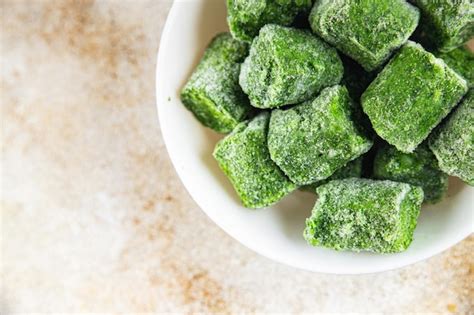 Premium Photo Frozen Spinach Portion Cube Semifinished Fresh Food