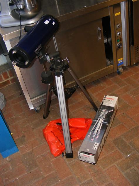 A Tasco Galaxsee Telescope On Stand With Accessories And A Hama Gamma 74 Camera Tripod