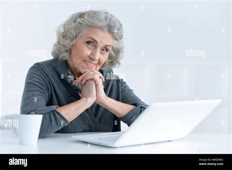 Mature Woman Working At Office Stock Photo Alamy