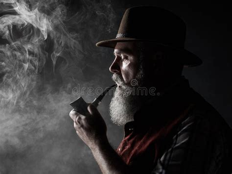 Dramatic Portrait Of Senior Smoking Tobacco Pipe Stock Image Image Of