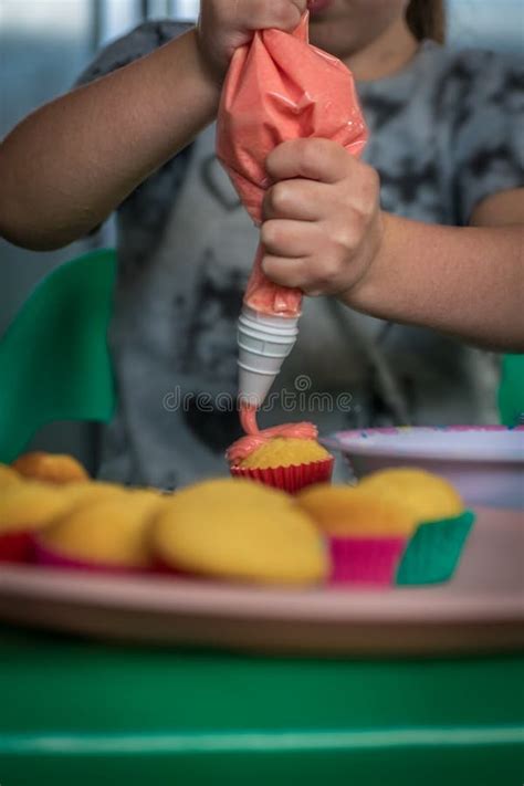 Little Girl Making Cupcakes at Home Stock Photo - Image of dessert ...